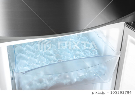 Plastic bags with ice cubes in fridge 105393794