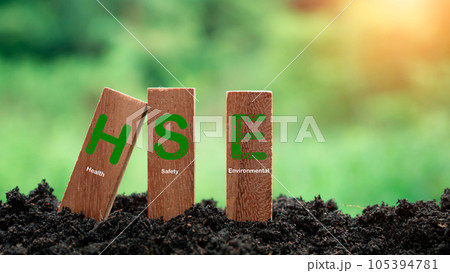 Wooden sticks stacked with HSE concept lettering on nature background. Concept of HSE Health Safety Environment Education Industry.words HSE on a woodblock It is an idea for health safety environment Wooden sticks stacked with HSE concept lettering on nature background. Concept of HSE Health Safety Environment Education Industry.words HSE on a woodblock It is an idea for health safety environment 105394781