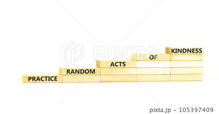 Practice random kind of kindness symbol. Concept words Practice random kind of kindness on wooden block. Beautiful white table white background. Business practice kindness concept. Copy space. 105397409