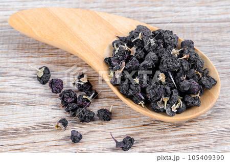 Black wolfberries or black goji berries Chinese herbs commonly used in traditional Chinese medicine. Black wolfberries or black goji berries Chinese herbs commonly used in traditional Chinese medicine. 105409390