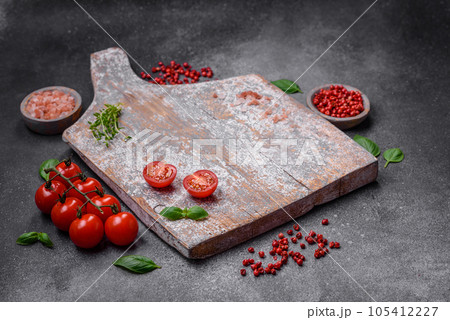 Ingredients for cooking cherry tomatoes, salt, spices and herbs Ingredients for cooking cherry tomatoes, salt, spices and herbs 105412227