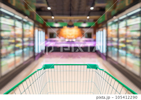 empty shopping cart in supermarket grocery store background empty shopping cart in supermarket grocery store background 105412290