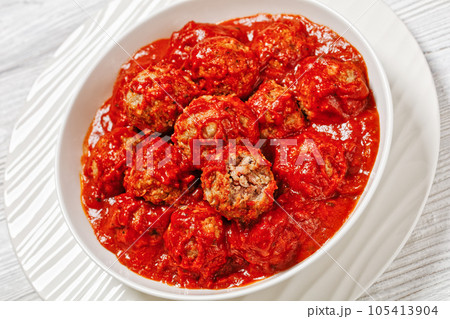 Iowa Ham Balls with tomato sauce in bowl Iowa Ham Balls with tomato sauce in bowl 105413904