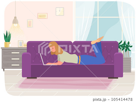 Woman lying with laptop on couch at home. Online communication, internet surfing, freelance 105414478