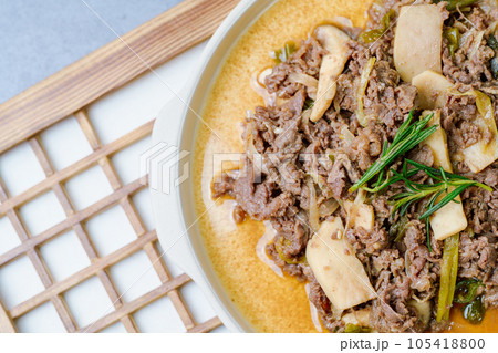Bulgogi, korean food, Bulgogi is prepared with beef that has been marinated in soy sauce, honey, minced green onion, garlic, sesame seeds, and pepper, and then grilled. The excess liquid can be mixed Bulgogi, korean food, Bulgogi is prepared with beef that has been marinated in soy sauce, honey, minced green onion, garlic, sesame seeds, and pepper, and then grilled. The excess liquid can be mixed 105418800