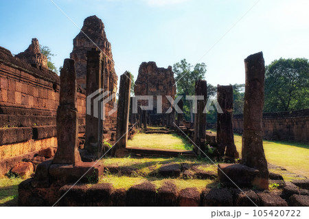 High-definition photograph capturing the ancient columns standing in the courtyard of the abandoned Hindu temple, Pre Rup. 105420722