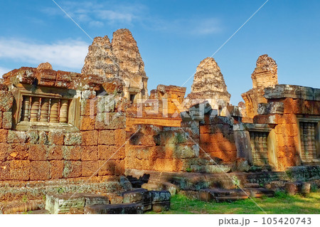 View of the towers of the famous Eastern Mebon, Cambodia. Ancient medieval Khmer building, landscape. View of the towers of the famous Eastern Mebon, Cambodia. Ancient medieval Khmer building, landscape. 105420743