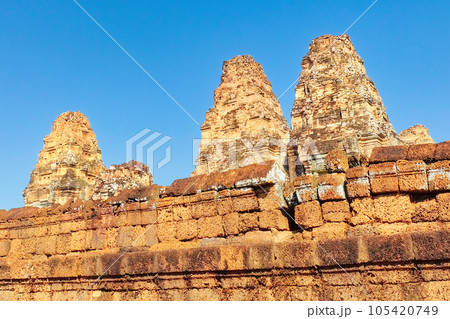 High-definition image showcasing the towers of the famous Eastern Mebon, an age-old medieval Khmer structure in Cambodia. High-definition image showcasing the towers of the famous Eastern Mebon, an age-old medieval Khmer structure in Cambodia. 105420749