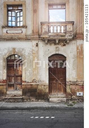 Street view of an old building facade, architecture background, Riobamba, Ecuador. 105421113
