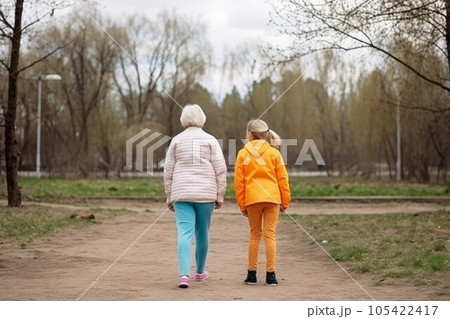 Back view granddaughter and grandmother doing sport. Healthy sport. Generate Ai Back view granddaughter and grandmother doing sport. Healthy sport. Generate Ai 105422417