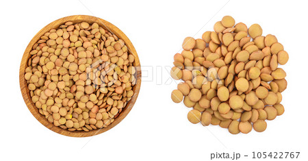 green lentil in wooden bowl isolated on white background. Top view green lentil in wooden bowl isolated on white background. Top view 105422767