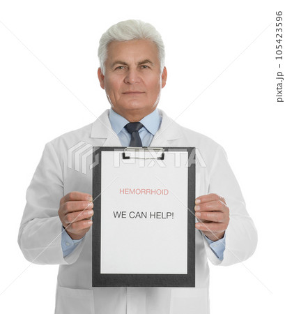 Doctor holding clipboard with words HEMORRHOID WE CAN HELP on white background Doctor holding clipboard with words HEMORRHOID WE CAN HELP on white background 105423596