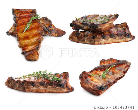 Set of delicious roasted ribs on white background Set of delicious roasted ribs on white background 105423741