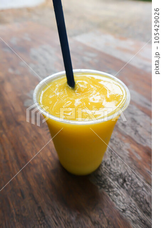 mango juice, mango smoothie or fruit juice 105429026