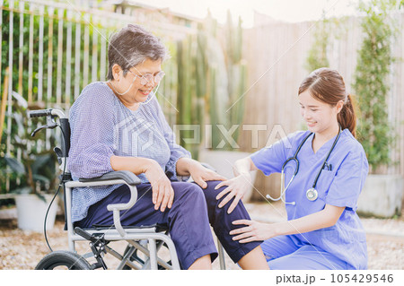 senior elderly adult woman with disability wheelchair in home care nurse doctor or physiotherapist help support relax outdoor senior elderly adult woman with disability wheelchair in home care nurse doctor or physiotherapist help support relax outdoor 105429546