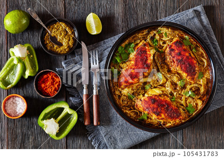 Cheesy Salsa Verde Chicken in dish, top view 105431783