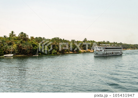 Panoramic view of fertile banks of Nile and everyday life during river cruise River near Luxor Egypt direction assuan 105431947