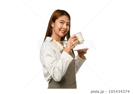 Beautiful woman wearing apron holding coffee cup isolated on white background. Small business startup concept Beautiful woman wearing apron holding coffee cup isolated on white background. Small business startup concept 105434374