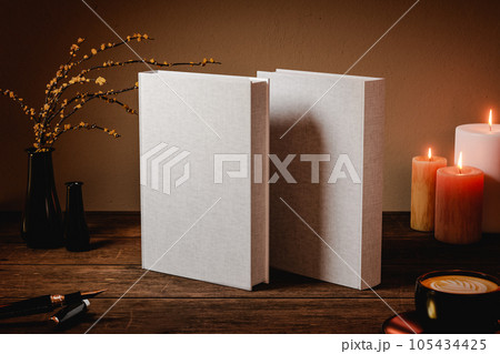 3D rendering of two books on wooden table 105434425