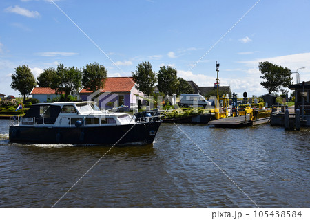 Den Helder, Netherlands. July 23, 2023. The ferry across the North Holland Canal at Stolperbrug 105438584