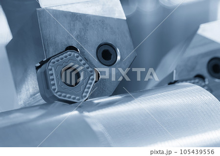 Close up the special purpose the lathe tool in the light blue scene. Close up the special purpose the lathe tool in the light blue scene. 105439556