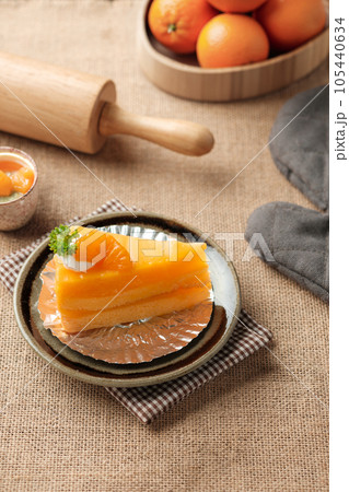 Orange cake topped with oranges. Orange cake topped with oranges. 105440634