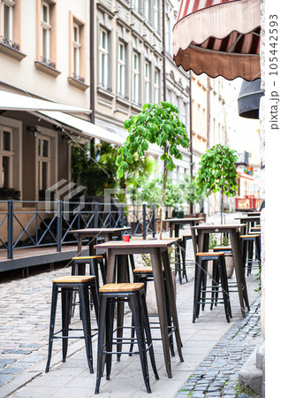Chairs and table on empty terrace at cafe . Chairs and table on empty terrace at cafe . 105442593