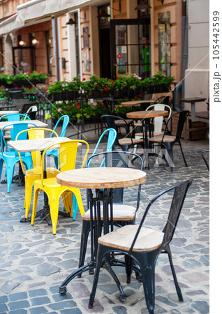 Chairs and table on empty terrace at cafe . Chairs and table on empty terrace at cafe . 105442599