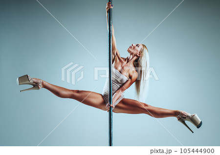 Woman pole dancing Woman pole dancing 105444900