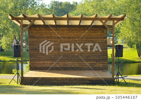 Outdoor wooden stage in outdoor parks open air Outdoor wooden stage in outdoor parks open air 105446187