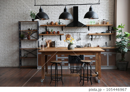 Beautiful kitchen interior with new stylish furniture Beautiful kitchen interior with new stylish furniture 105446967