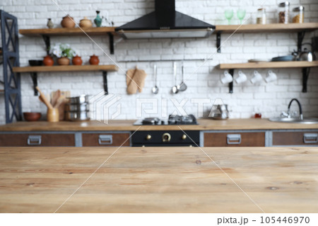 Empty wooden table in beautiful kitchen. Interior design Empty wooden table in beautiful kitchen. Interior design 105446970