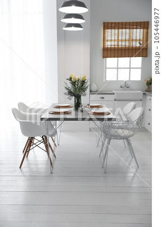 Beautiful dining room interior with new stylish furniture Beautiful dining room interior with new stylish furniture 105446977