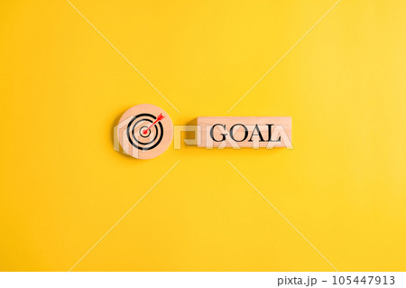Wooden block of target goal for business strategy planning management, Progress of business and analyzing financial investment data, Business process and workflow development 105447913