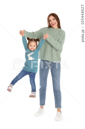 Young mother with little daughter having fun on white background 105448027