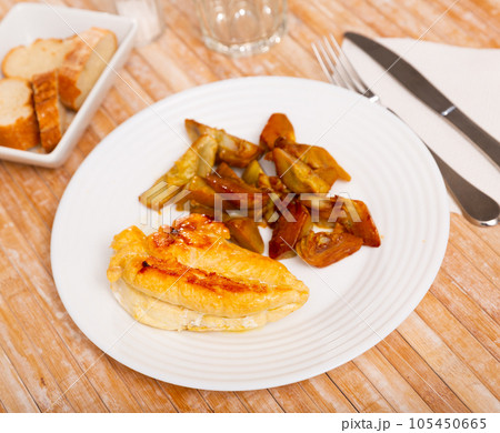 Grilled chicken breast with artichokes, healthy dinner Grilled chicken breast with artichokes, healthy dinner 105450665