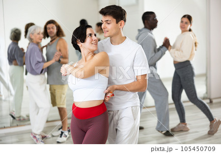 Dancing positive couples learning salsa 105450709