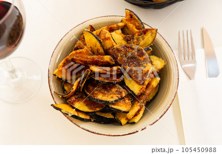 Plate with prepared food eggplants with honey 105450988