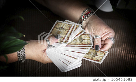 Concept of psychic advisor or ways of divination with cards. Concept of psychic advisor or ways of divination with cards. 105451092