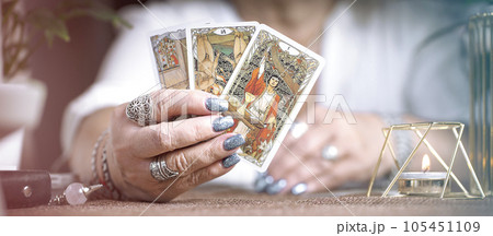 Concept of psychic advisor or ways of divination with cards. Concept of psychic advisor or ways of divination with cards. 105451109