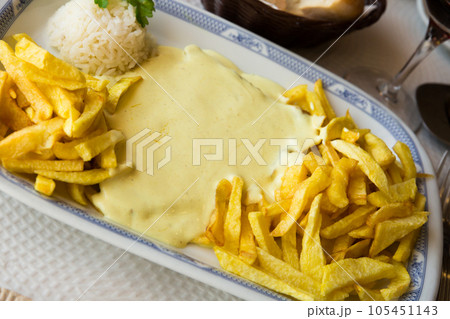 Veal steak with cream sauce 105451143