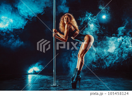 Pole dance woman 105458124