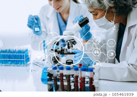 Scientist two woman with tablet and laptop, laboratory and ecofriendly science. Agriculture, research and scientists with online reading, test samples for global warming, analytics and tech. with 105461939