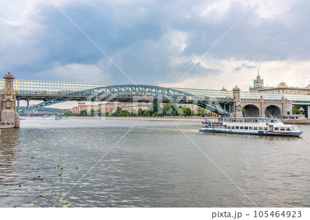 View of the Moscow river embakment, Pushkinsky bridge and cruise ships at sunset. 105464923