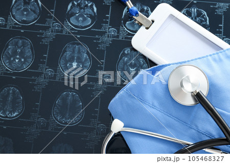 MRI scans or magnetic resonance imaging with a stethoscope and a blank card. MRI scans or magnetic resonance imaging with a stethoscope and a blank card. 105468327
