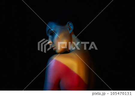 beautiful woman in color lights. Female Back 105470131