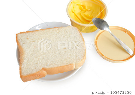 Toasted bread and butter on white background. Toasted bread and butter on white background. 105473250