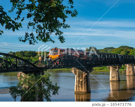 The train is passing through the Death Railway Bridge over the River Kwai in Kanchanaburi. During World War Two Japan constructed railway from Thailand to Burma This is now know the Death Railway. The train is passing through the Death Railway Bridge over the River Kwai in Kanchanaburi. During World War Two Japan constructed railway from Thailand to Burma This is now know the Death Railway. 105473776