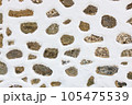Close-up of Canarian natural stone wall with brown stones. Background. 105475539