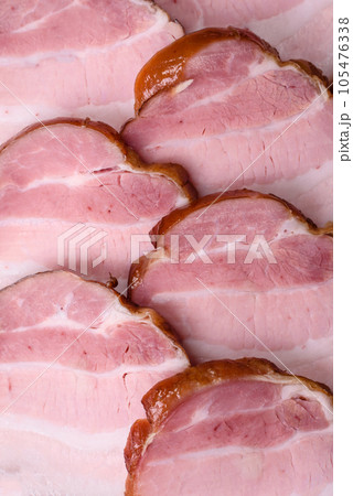 Delicious smoked bacon with salt, spices and herbs 105476338